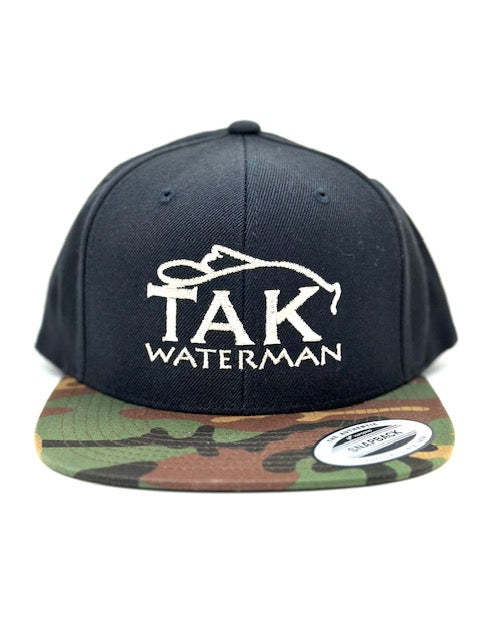 Tak Waterman | Snap Back Hat | Black w/ Camo Brim